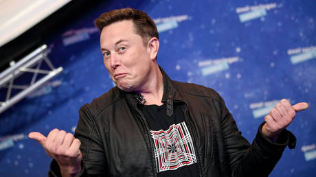 Billionaire Elon Musk is shown attending a December 2020 awards event in Germany,