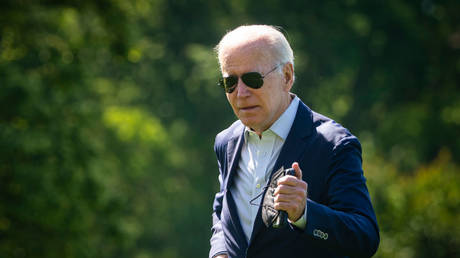 President Joe Biden is shown arriving at the White House on Monday after a weekend getaway at his Delaware beach house.