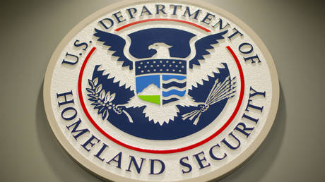 FILE PHOTO: The Department of Homeland Security logo is seen during a joint news conference in Washington, DC.