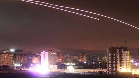 FILE PHOTO: Syrian air defense missiles rise into the sky amid an Israeli attack on multiple sites in Damascus, Syria, May 10, 2018.