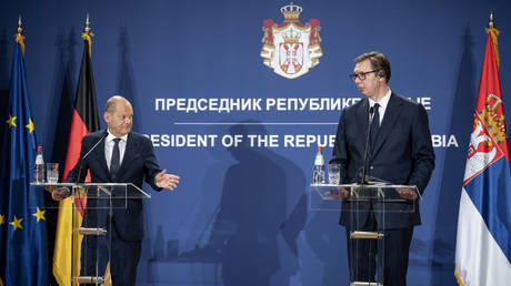 German Chancellor Olaf Scholz and Serbian President Aleksandar Vucic hold a press conference in Belgrade, June 20, 2022.