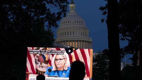 People gather outside of the US Capitol to watch the January 6 riot investigation hearing in Washington, June 9, 2022