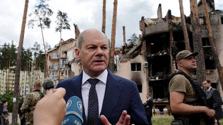German Chancellor Olaf Scholz talks to the media during a visit to Kiev's suburb of Irpin, Ukraine, on June 16, 2022.