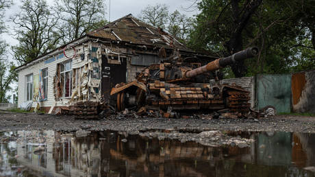 A burnt Ukrainian tank in Kolychivka, Ukraine.