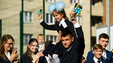 Schoolchildren attend a ceremony to mark the start of the school year in Kiev, Ukraine, September 1, 2017.