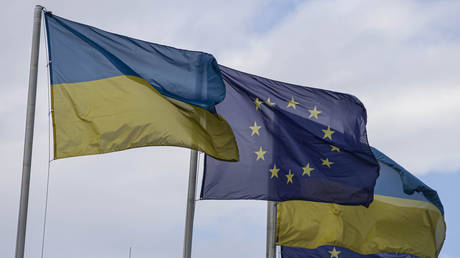 Ukrainian flags fly next to EU flags in Kiev, Ukraine on June 22, 2022.