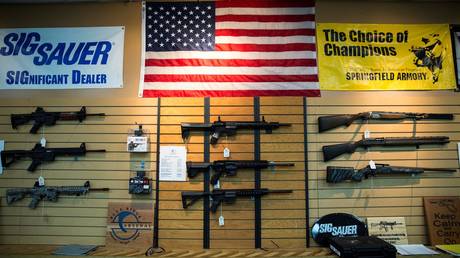 FILE PHOTO: AR-15 style rifles and shotguns for sale at Blue Ridge Arsenal in Chantilly, Va., USA. © Samuel Corum / Anadolu Agency / Getty Images