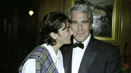 FILE PHOTO. Convicted pedophile Jeffrey Epstein and his accomplice Ghislaine Maxwell