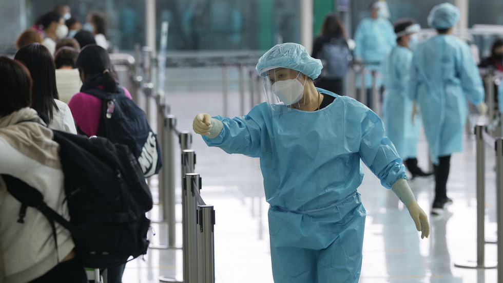 Hong Kong unveils Covid quarantine bracelets — RT World Information