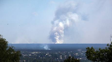 FILE PHOTO: Smoke rises from the city of Lisichansk in the Lugansk People's Republic, June 21, 2022 © AFP / Anatoli Stepanov