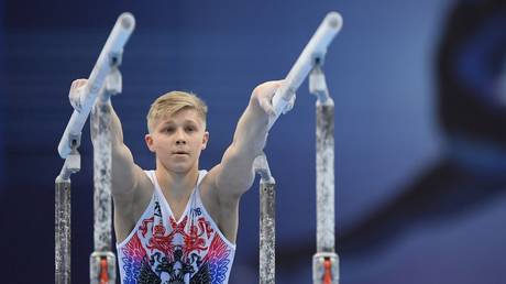 Barred: Russian gymnast Ivan Kuliak. © RIA / Maxim Bododvid