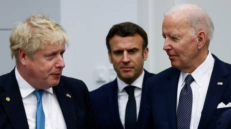 FILE PHOTO. British Prime Minister Boris Johnson, France's President Emmanuel Macron and U.S. President Joe Biden.