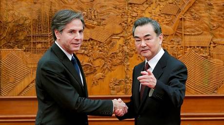 Chinese Foreign Minister Wang Yi is shown meeting with Anthony Blinken, then deputy US secretary of state, in February 2015 in Beijing.