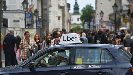 Une voiture Uber à Cracovie, Pologne, mai 2022. © Artur Widak / NurPhoto / Getty Images