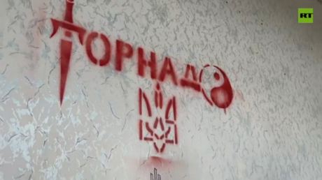 Tornado's insignia spray-painted on the wall.