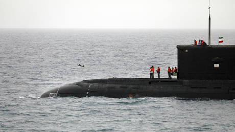 FILE PHOTO. A drone is launched from an Iranian submarine during a drill in the Indian Ocean.