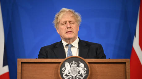 FILE PHOTO: Boris Johnson speaks during a press conference in Downing Street, London, May 25 2022 © AP / Leon Neal
