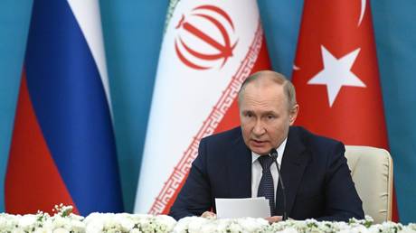 Putin tells US to cease ‘looting’ Syria