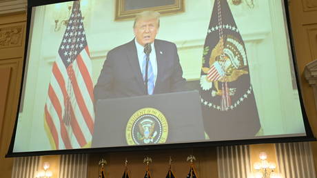 A video of former US President Donald Trump recording an address to the nation on January 7, 2021, is displayed on a screen during a hearing by the House Select Committee to investigate the January 6th attack on the US Capitol in the Cannon House Office Building in Washington, DC, on July 21, 2022.