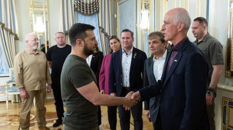 Rep. Adam Smith (D-WA) meets Ukrainian President Volodymyr Zelensky in Kiev, Ukraine, on July 23, 2022.