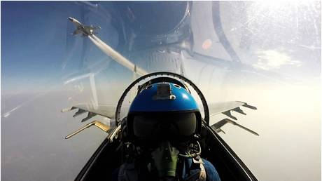 FILE PHOTO: A Chinese fighter pilot during a military drill near China’s Hainan Island, 2016. © AFP