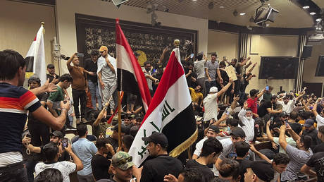 Protesters breach the parliament building in Baghdad, Iraq, July 27, 2022.