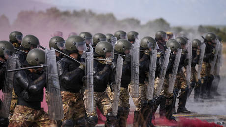 FILE PHOTO. Italian NATO soldiers serving in the NATO-led peacekeeping force (KFOR) take part in a crowd and riot control exercise.