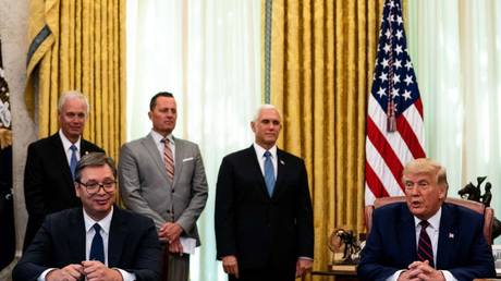 File photo: Ambassador Richard Grenell (gray suit) attends a White House signing ceremony with Serbian President Aleksandar Vucic and US President Donald Trump, September 4, 2020