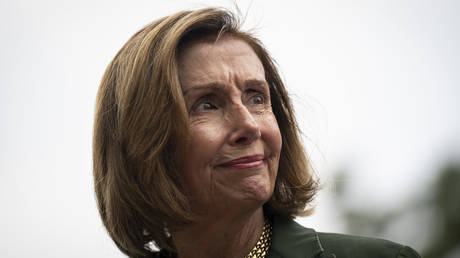 FILE PHOTO. Nancy Pelosi arrives at a news conference on Capitol Hill. ©Drew Angerer / Getty Images
