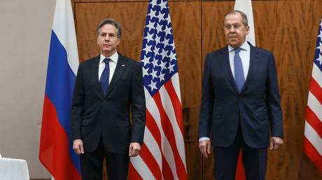 FILE PHOTO. Antony Blinken (L) and Sergey Lavrov (R) meet in Switzerland. ©Russian Foreign Ministry Handout via Getty Images)