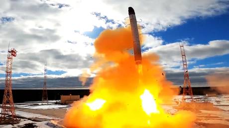 FILE PHOTO: An RS-28 Sarmat intercontinental ballistic missile blasts off during a test launch from the Plesetsk Cosmodrome, Russia, April 24, 2022