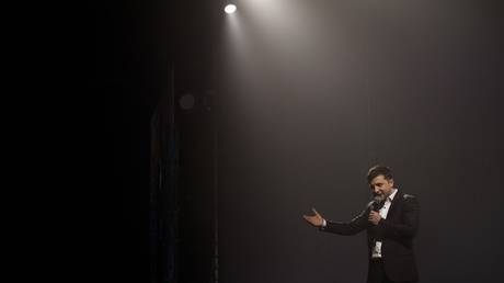 FILE: Ukrainian comedian and presidential candidate Volodymyr Zelenskyy performs during a show in Brovary, near Kiev, Ukraine on March 29, 2019.
