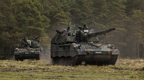 FILE PHOTO. Soldiers of the Bundeswehr, the German armed forces, participate with the Panzerhaubitze 2000 - the Pzh 2000 self-propelled howitzer in the Wettiner Heide (Wettiner Meadow) international joint military exercises of NATO Response Force (Land) near Munster, Germany.