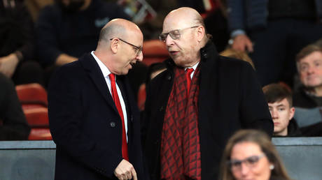 The Glazer brothers pictured at Old Trafford. © Mike Egerton / PA Images via Getty Images