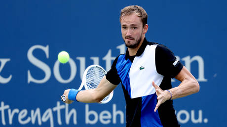 Medvedev moves on to face tough American test