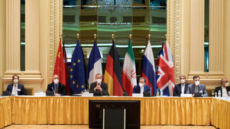 FILE PHOTO: Representatives of the EU (L) and Iran (R) attend the Iran nuclear talks at the Grand Hotel  in Vienna, Austria, on April 06, 2021.