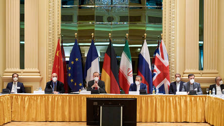 FILE PHOTO: Representatives of the EU (L) and Iran (R) attend the Iran nuclear talks at the Grand Hotel in Vienna, Austria, on April 06, 2021.