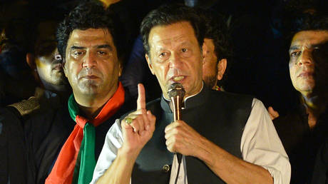 Khan speaking at Saturday's rally © AFP / Farooq Naeem