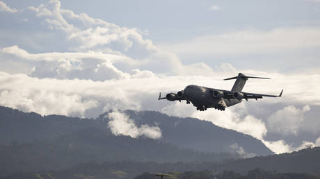 Australian C-17 flies over Solomon Islands © AFP / CPL Brandon Grey/Australian Dept of Defense