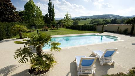 FILE PHOTO: A swimming pool at a private house. © Henri-Alain SEGALEN / Gamma-Rapho via Getty Images