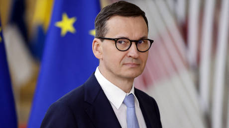 Poland's Prime Minister Mateusz Morawiecki arrives for a meeting of the European Council at The European Council Building in Brussels on June 24, 2022.