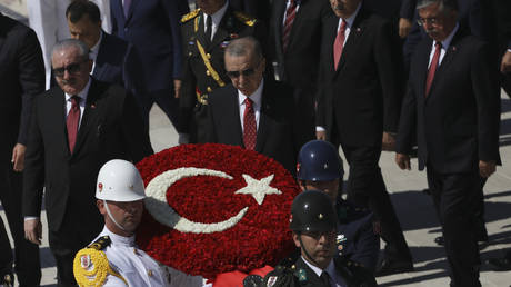 Turkish President Recep Tayyip Erdogan, front right, marks Victory Day in Ankara, August 30, 2022.