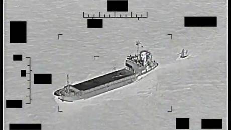 An Iranian support vessel is seen towing an American Saildrone Explorer unmanned surface vessel in international waters of the Persian Gulf, August 29, 2022.