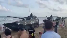 Online footage shows China amassing military