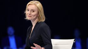 Protesters heckle Liz Truss on cost of living and climate