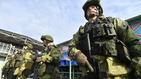 Putin orders Russian military to boost manpower