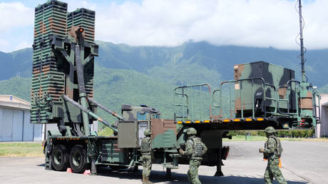 Taiwanese soldiers operate a Sky Bow III (Tien-Kung III) surface-to-air missile system at a base in Taiwan's southeastern Hualien county, August 18, 2022.