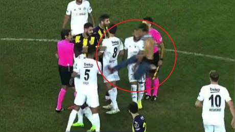 Shocking scenes as Turkish fan launches kung-fu attack on footballer (VIDEO)