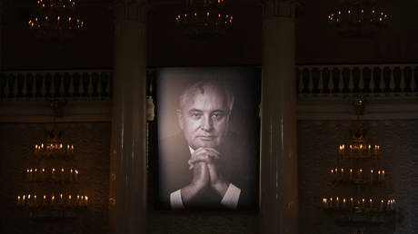 A portrait of Mikhail Gorbachev, the last leader of the Soviet Union, is displayed on the wall during his memorial service at the Column Hall of the House of Unions in Moscow, on September 3, 2022.
