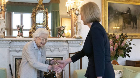 Queen Elizabeth greets newly elected leader of the Conservative party Liz Truss as she arrives at Balmoral Castle on September 6, 2022 in Aberdeen, Scotland